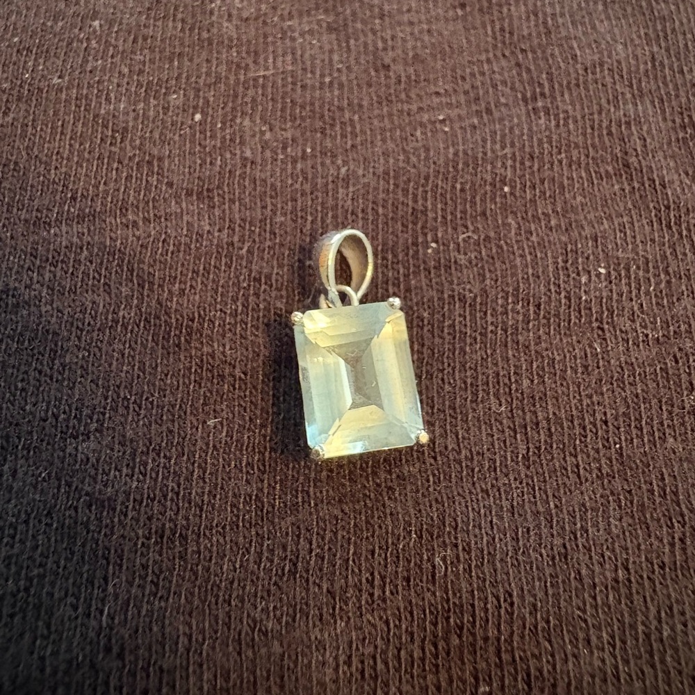 Elegant tanzanite silver charm